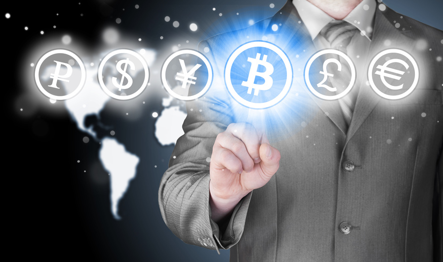 Choosing bitcoins, businessman pressing touch screen button.